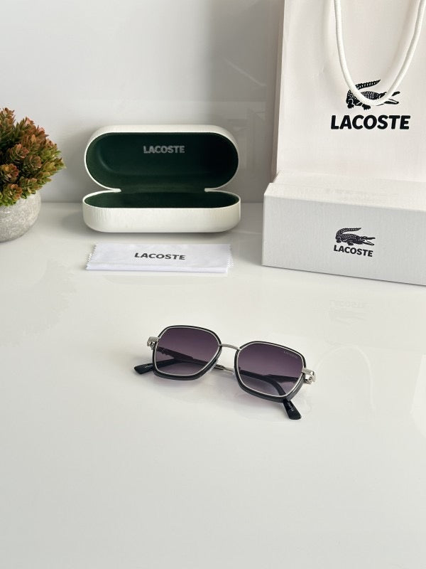 Lacoste Silver Black DC with original box and kit