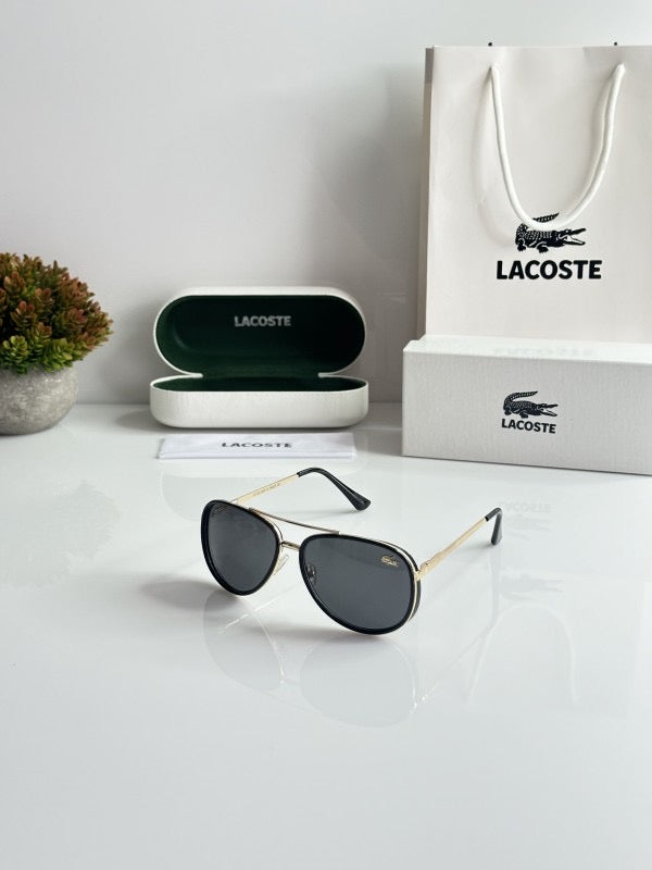 Lacoste Gold Black with original box and kit