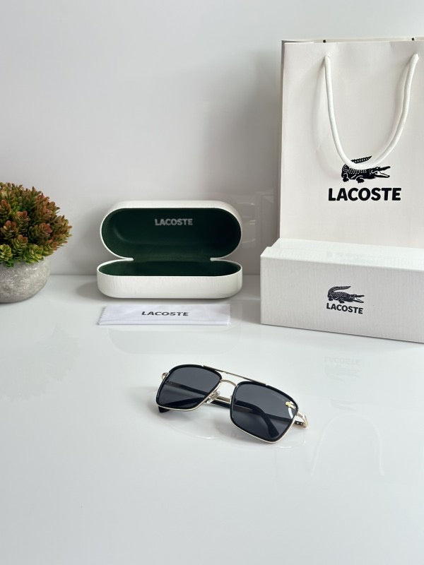 Lacoste Gold Black with original box and kit