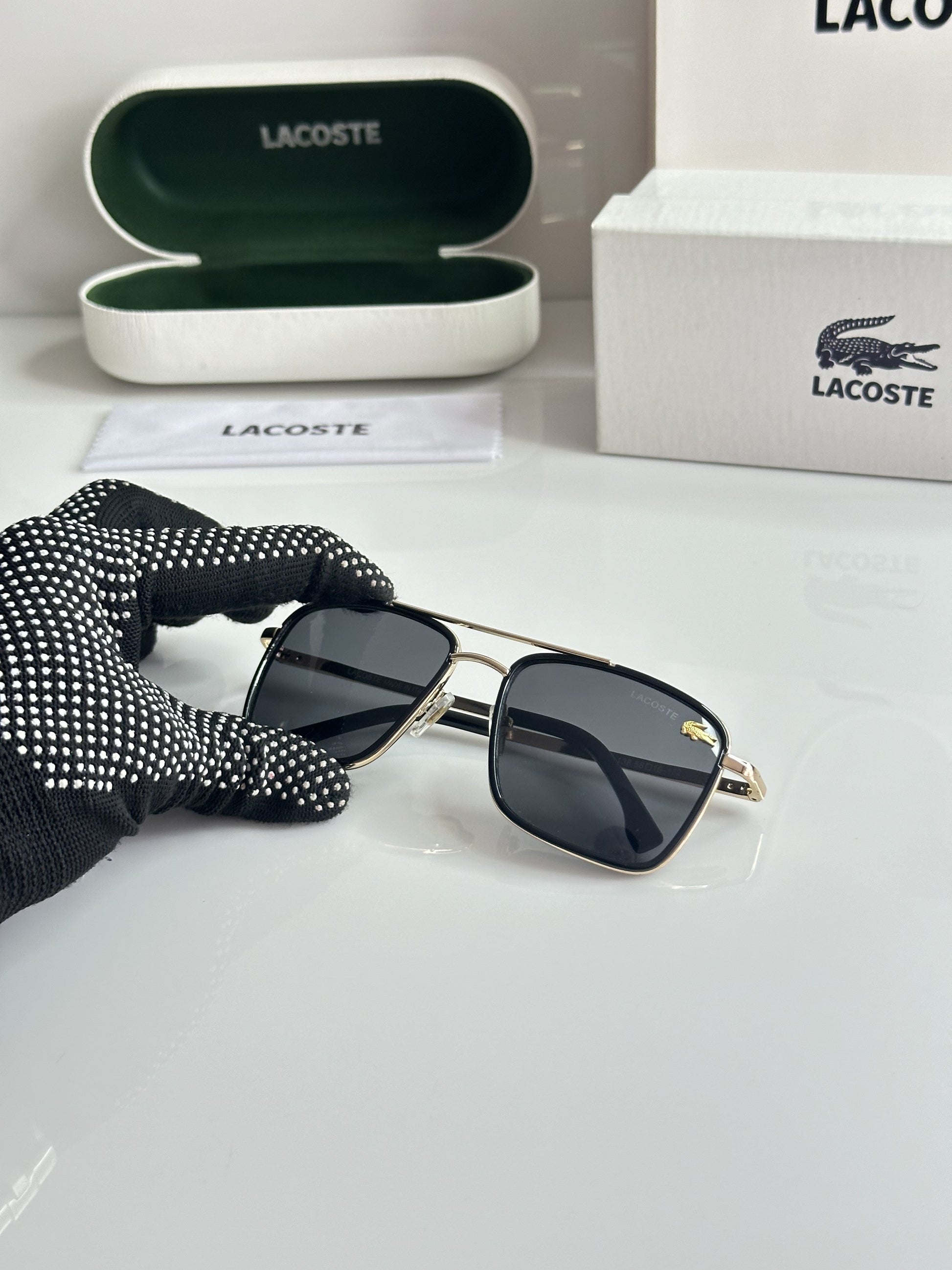 Lacoste Gold Black with original box and kit