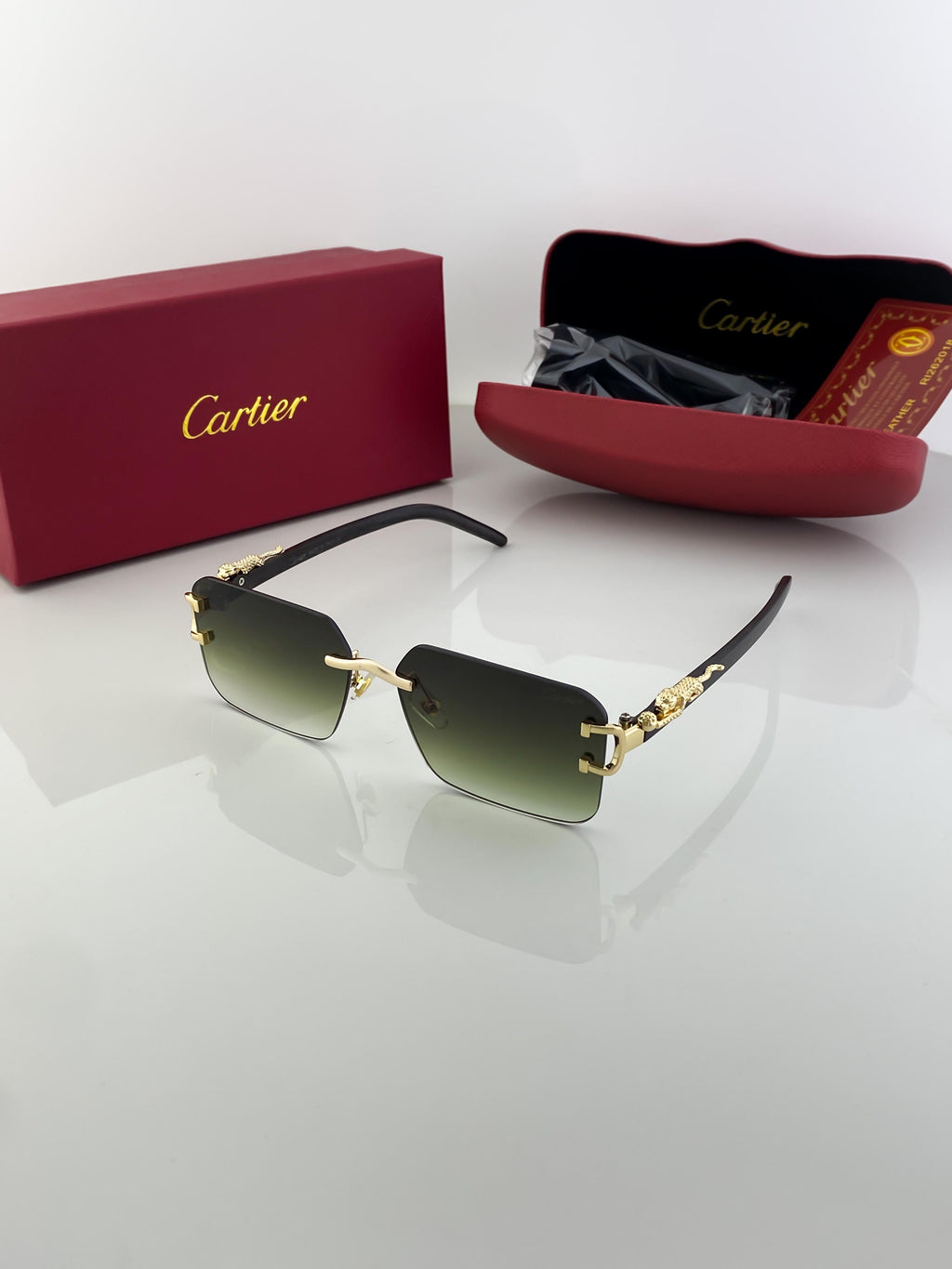 Cartier green shade sunglasses with original box and kit