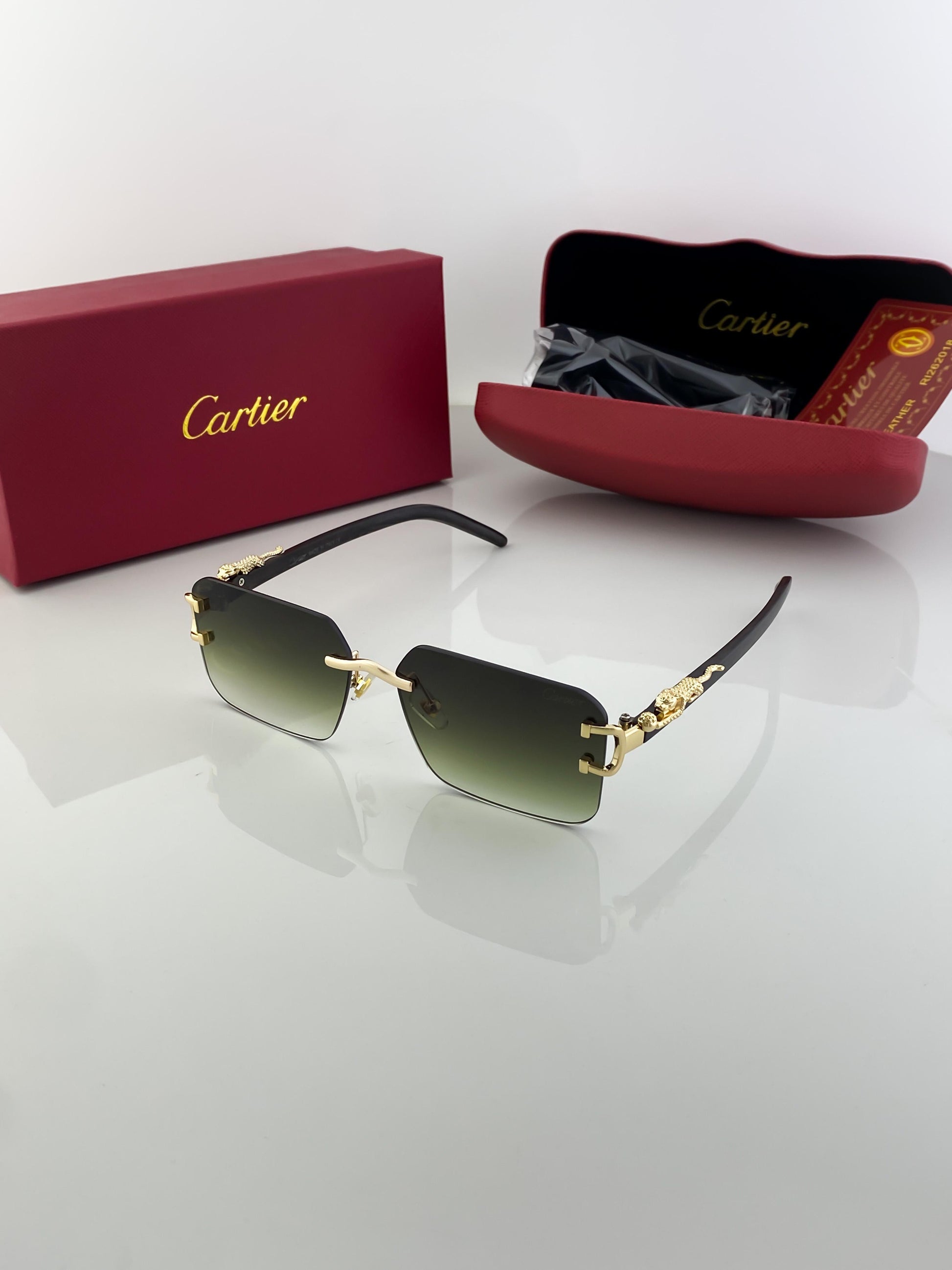 Cartier green shade sunglasses with original box and kit