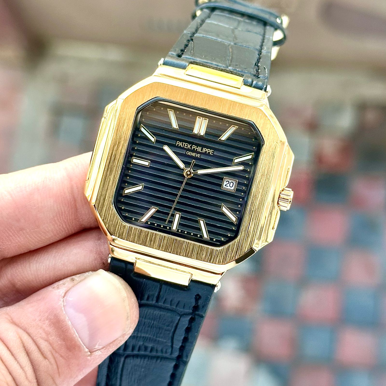 PATEK PHILIPPE slim watch with leather belt