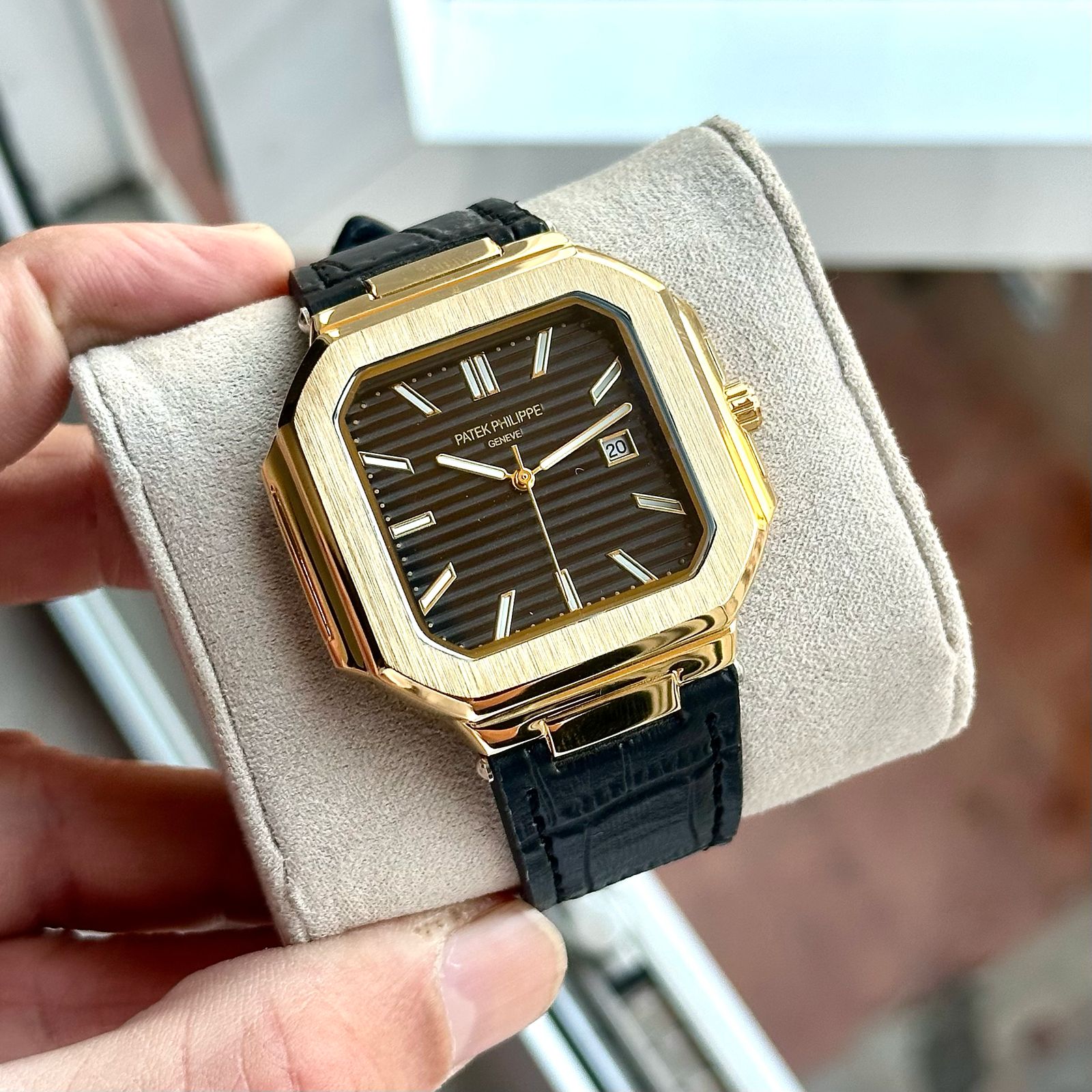 PATEK PHILIPPE slim watch with leather belt