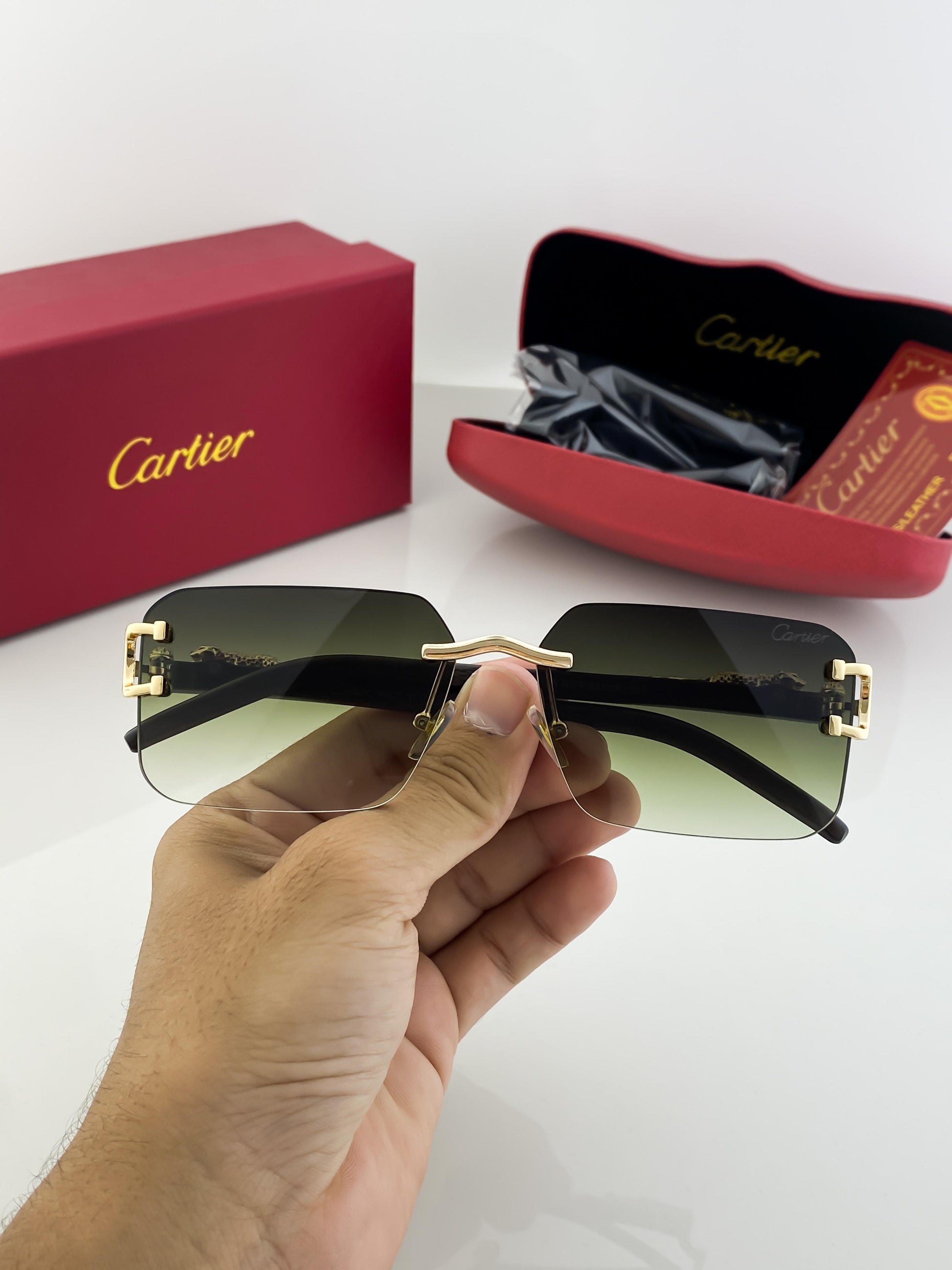 Cartier green shade sunglasses with original box and kit