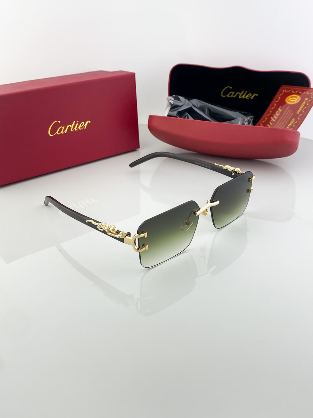 Cartier green shade sunglasses with original box and kit