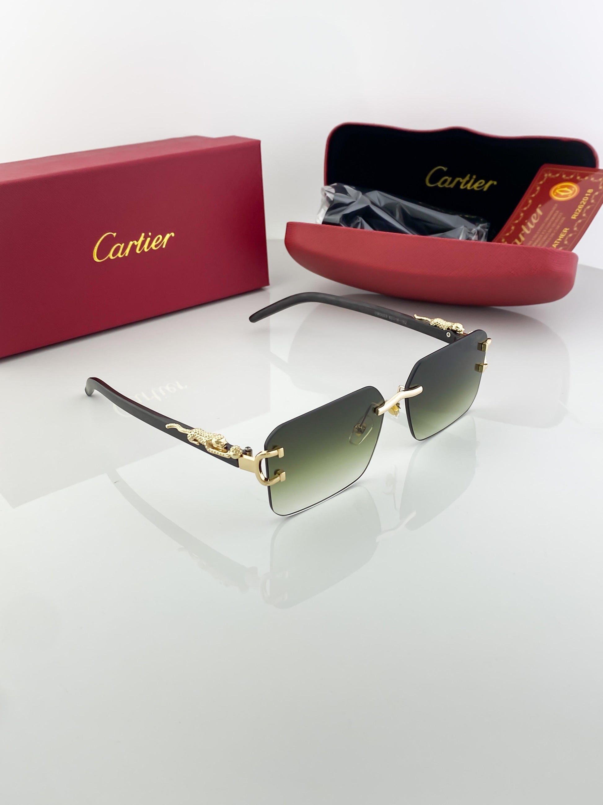 Cartier green shade sunglasses with original box and kit