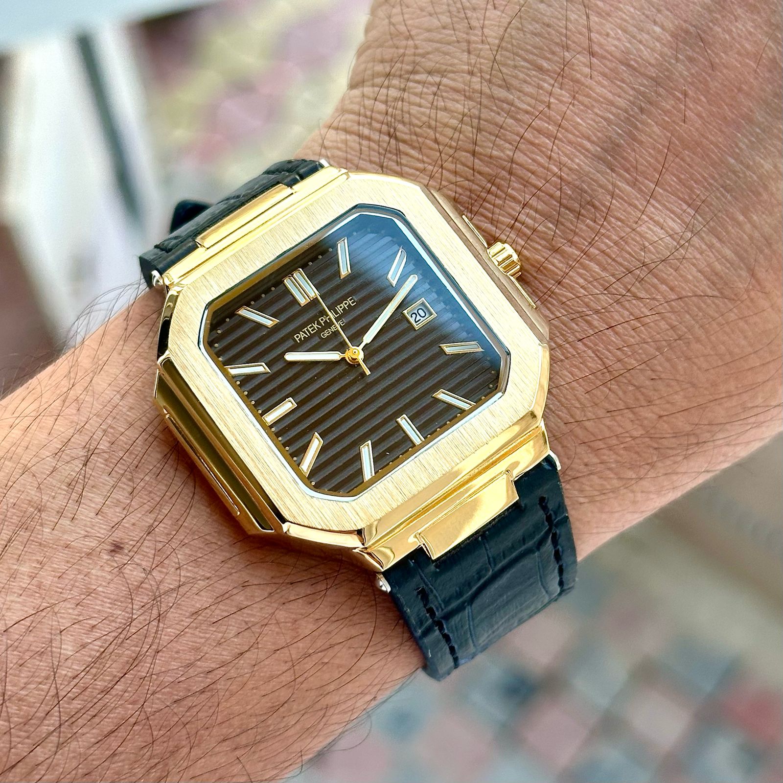 PATEK PHILIPPE slim watch with leather belt