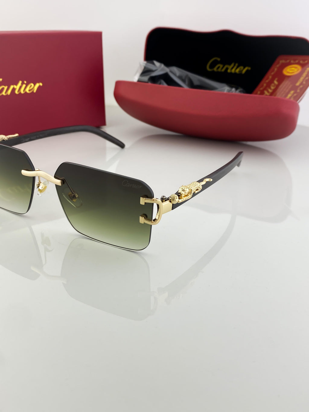 Cartier green shade sunglasses with original box and kit