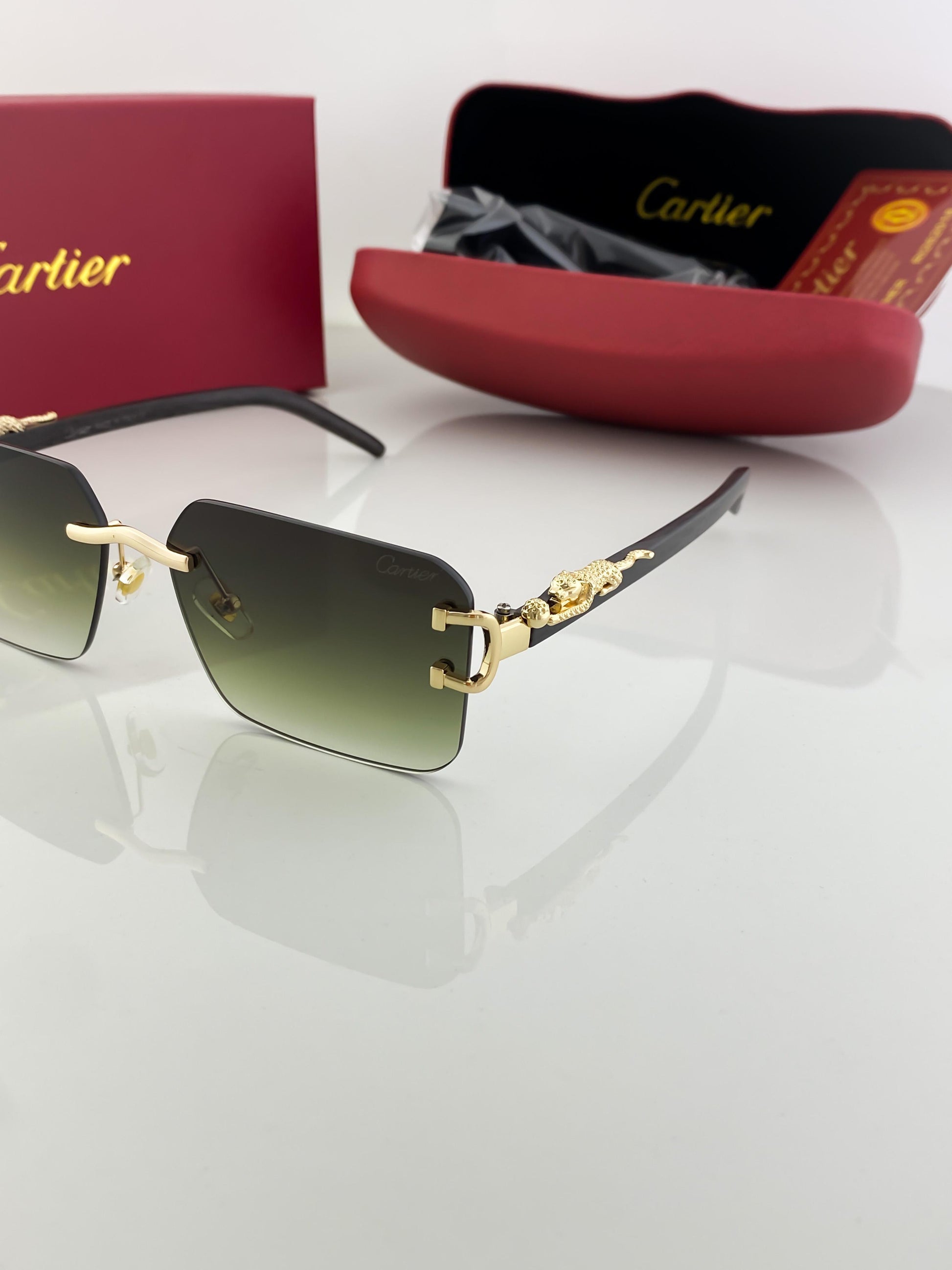 Cartier green shade sunglasses with original box and kit